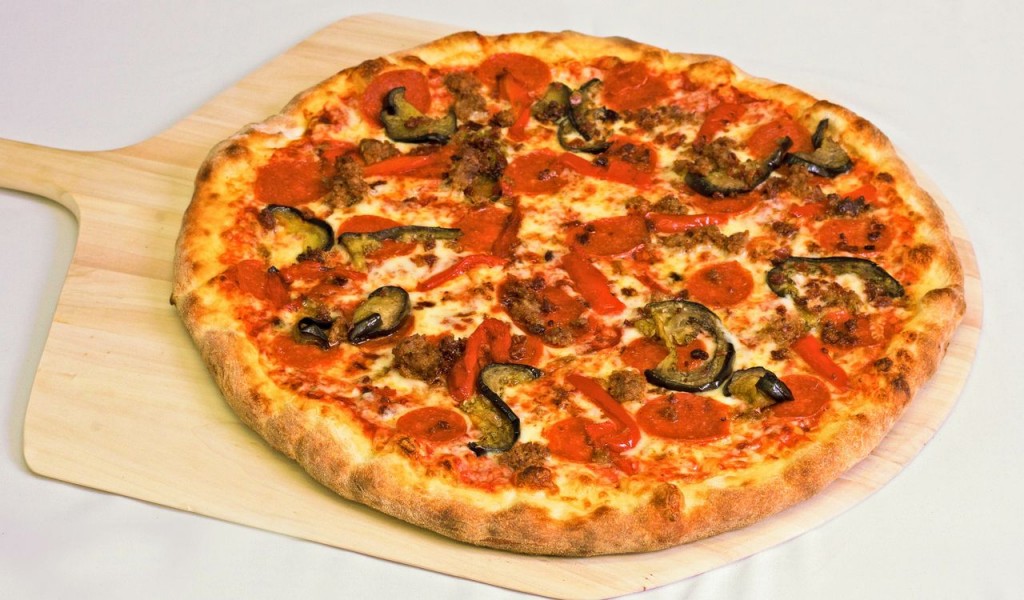 mozzarella, sausage, bacon, pepperoni, peppers, and eggplant pizza