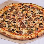 mozzarella, meatballs, onions, olives, and basil pizza in 89118